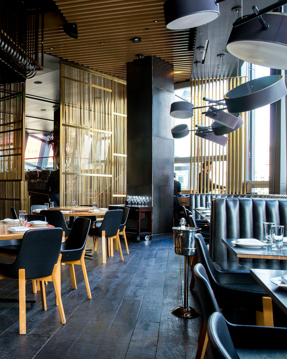 Restaurant dining room with tables set for service